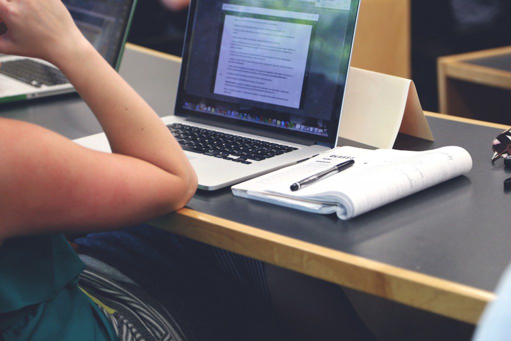 TCU Neeley faculty using computer