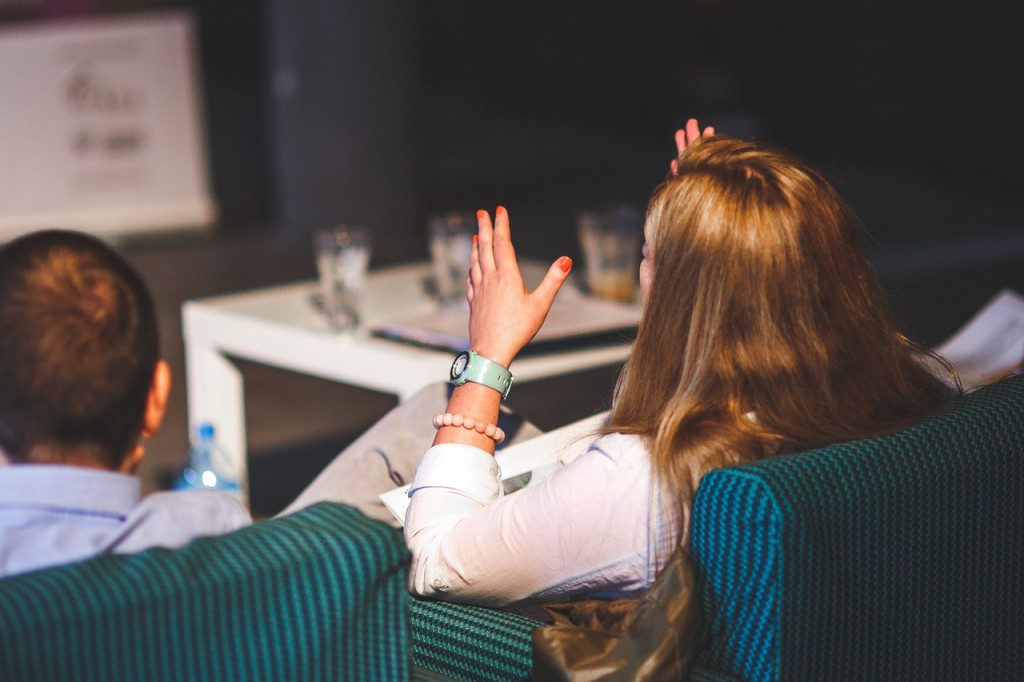 woman speaking with hands