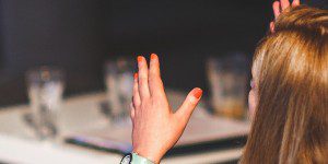 woman speaking with hands