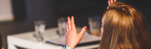 woman speaking with hands