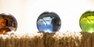 three marbles signifying the choice of choosing the right mba program